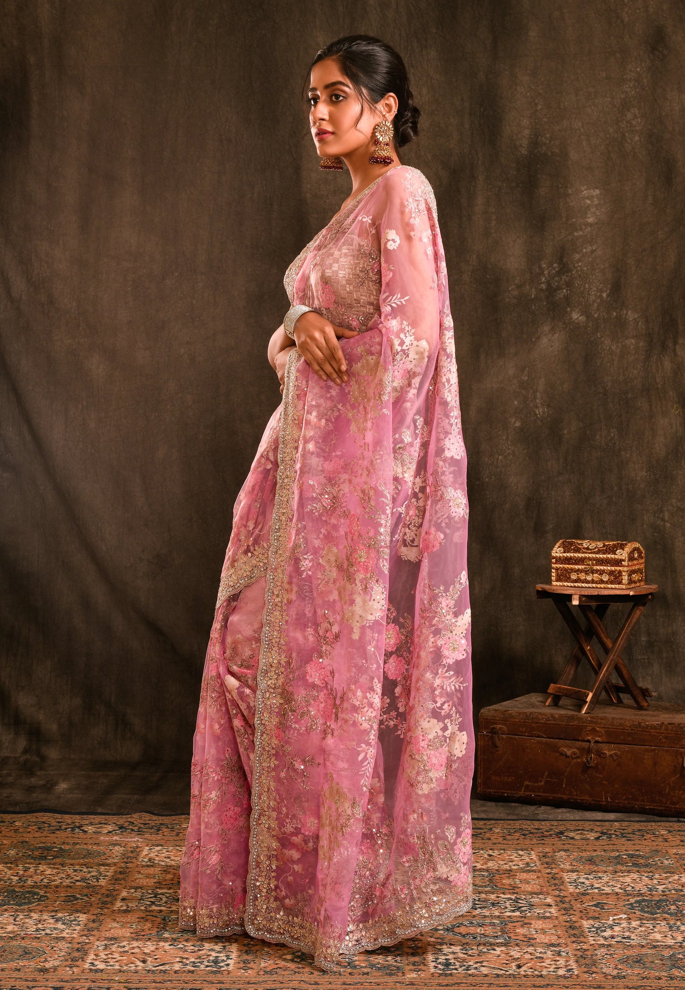 Pastel Pink Organza Saree With Floral Prints Throughout