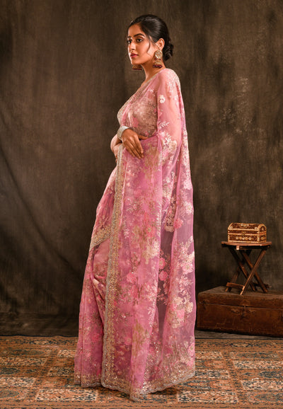Pastel Pink Organza Saree With Floral Prints Throughout