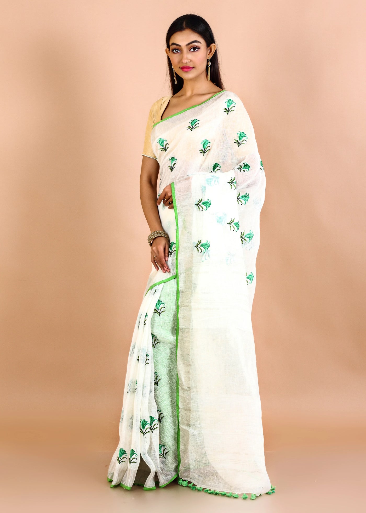 Off White Pure Linen Floral Embroidery Saree With Jadi Border pompom